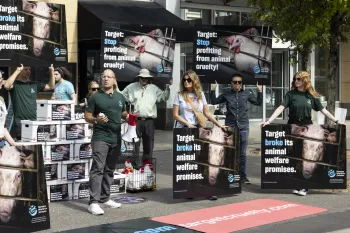 Multiple people protesting with signs